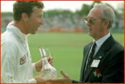 Michael Atherton makes a presentation to Brian Statham