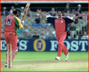 Wasim Akram bowls James Ormond