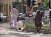 Michael Atherton walks off (down St. John's High Street) Antigua, West Indies.