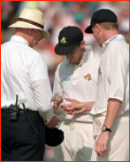 Knocked the cover off...umpire Plews with Crawley & Martin