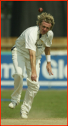 Dominic Cork bowling