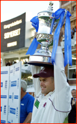 Captain Jamie Cox lifts the  C&G Trophy, 2001