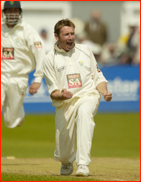 Robert Croft celebrates the wicket of Vikram Solanki