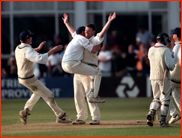 Karl Krikken hugs Vince Clarke after winning the NatWest semi