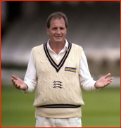 John Emburey after being hit into the pavilion by Brian Lara