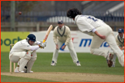 Matthew Walker ducks a ball from Jon Lewis