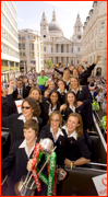 The Ashes winning England team celebrate on an open top bus through London.