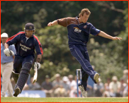 Bowler Neil Saker tries to run out Owais Shah