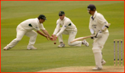 Mark Ealham & David Hussey field a ball from Ed Smith