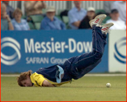 Alex Gidman lands on his face after a failed catch attempt