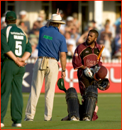 Riki Wessels down as runner Bilal Shafayat gets the word