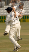 Alex Tudor lifts team-mate Andy Bichel after a win