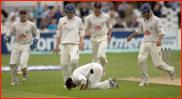 Mushtaq Ahmed gives thanks for his 100th wicket 