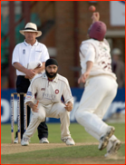 Monty Panesar watches Steven Crook field off his bowling
