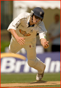 Joe Denly fields off the bowling of James Tredwell