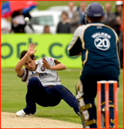 Matthew Walker drives back past Jade Dernbach for four