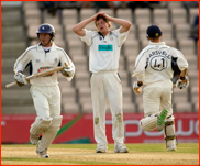 Bowler David Balcombe as Jones and van Jaarsveld run