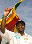 Muttiah Muralitharan celebrates his world record 709th Test wicket.