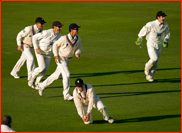 Celebrations as Wes Durston catches Andre Adams