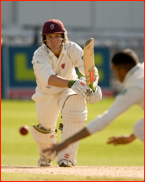 James Hildreth drives back past bowler Adil Rashid