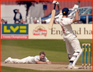 Luke Wright falls over bowling to Sajid Mahmood