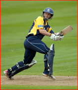 Jim Troughton paddles a ball from Simon Cook