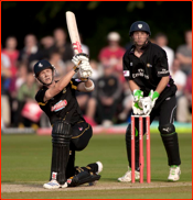 Joe Denly bats, watched by wicket keeper Philip Mustard