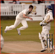 Chris Rogers avoids a ball off Steven Finn