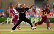 Alfonso Thomas fielding off his own bowling