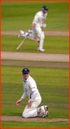 David Hussey runs as captain Andrew Gale watches