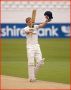 Joe Root celebrates his century v Northamptonshire, 2012