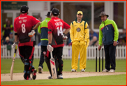 Aus captain Michael Clarke watches the rain fall, 2012