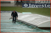 Head Groundsman, Andy Fogarty, checks the covers