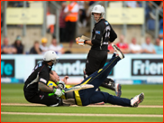 Bowler Sean Ervine collides with batsman Peter Trego