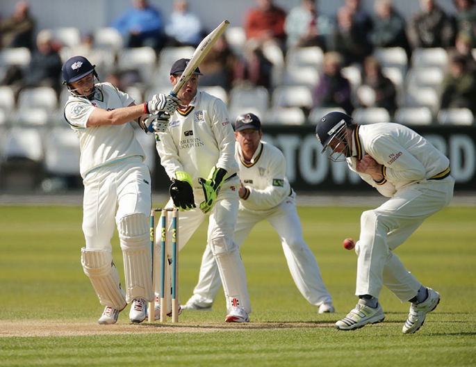 Joe Root (182) hits Durham close fielder Keaton Jennings