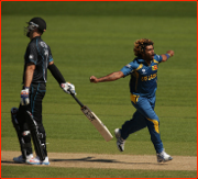 Lasith Malinga celebrates removing Daniel Vettori, 2013