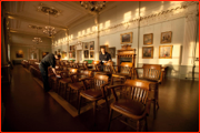 Cleaning the Lord's Long Room at first light.