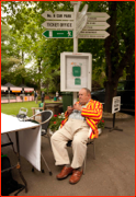 A member takes a break by the Coronation Garden at Lord's.