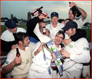 Steve James is doused after winning the 97 Championship