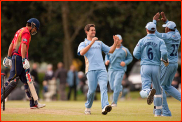 Tim Groenewald celebrates the wicket of Alastair Cook