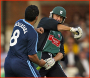 Adam Hollioake and Andy Bichel have a mock fight