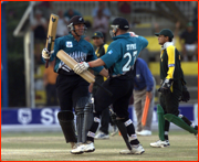 Craig McMillan and Scott Styris celebrate beating Pakistan.