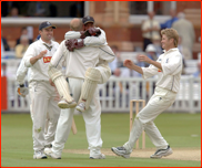 Keith Piper celebrates catching Andy Flower off Neil Smith