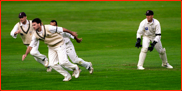 Alec Stewart watches as the slips chase the ball, 1997