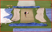 On the eve of the 2nd Test in Wellington. England's Alec Stewart inspects the pitch.