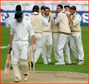 Celebrations after Ally Brown catches Iain Sutcliffe