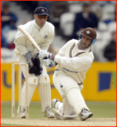 Graham Thorpe in action, watched by Kent's Paul Nixon