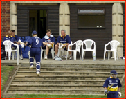 Coach Bob Woolmer watches the procession of batsmen