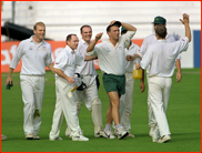 Injured captain James Whitaker celebrates, 1998 winners