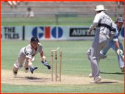 Brian Young runs out Allan Lamb.